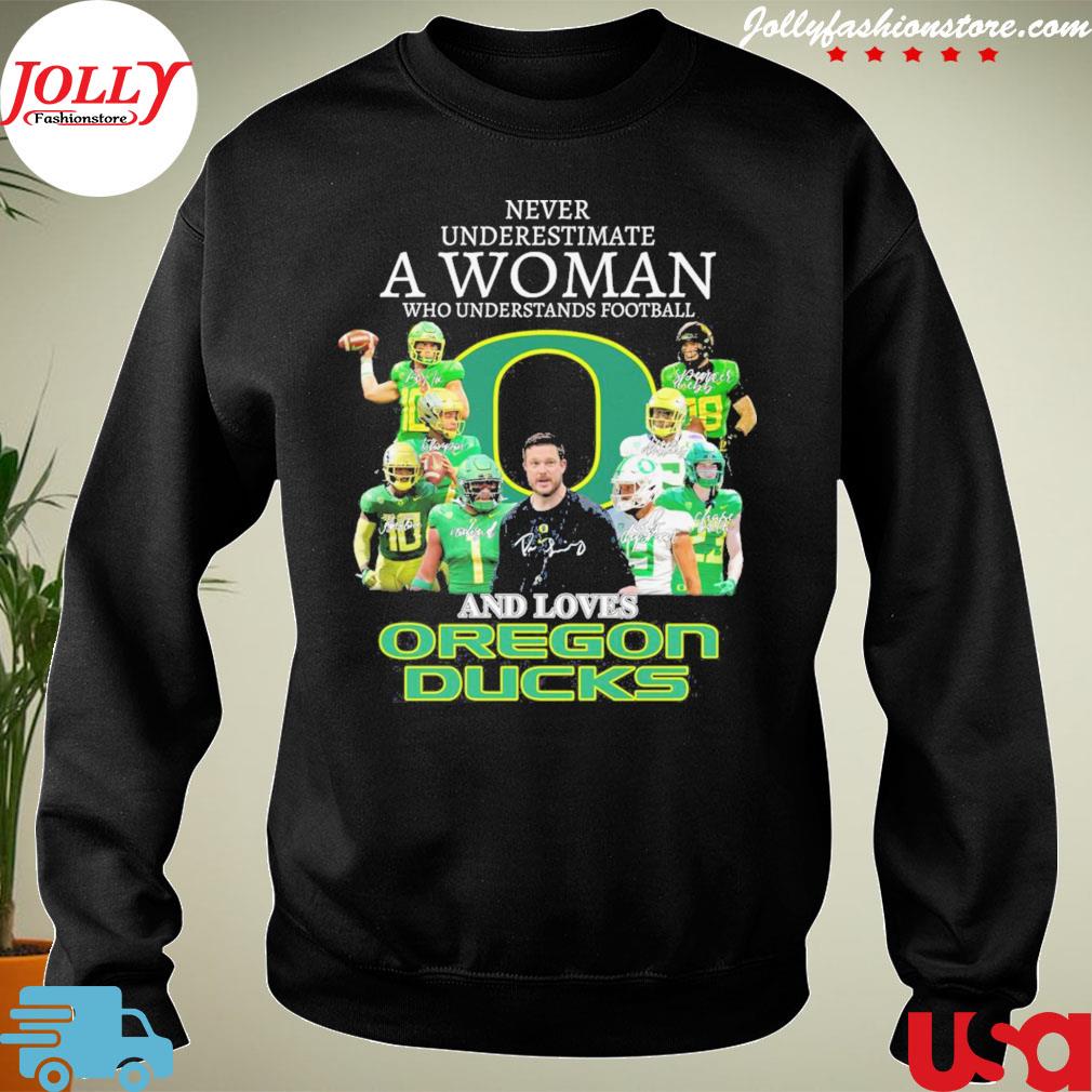 Never underestimate a woman who understands Football and love Oregon ducks s Sweater